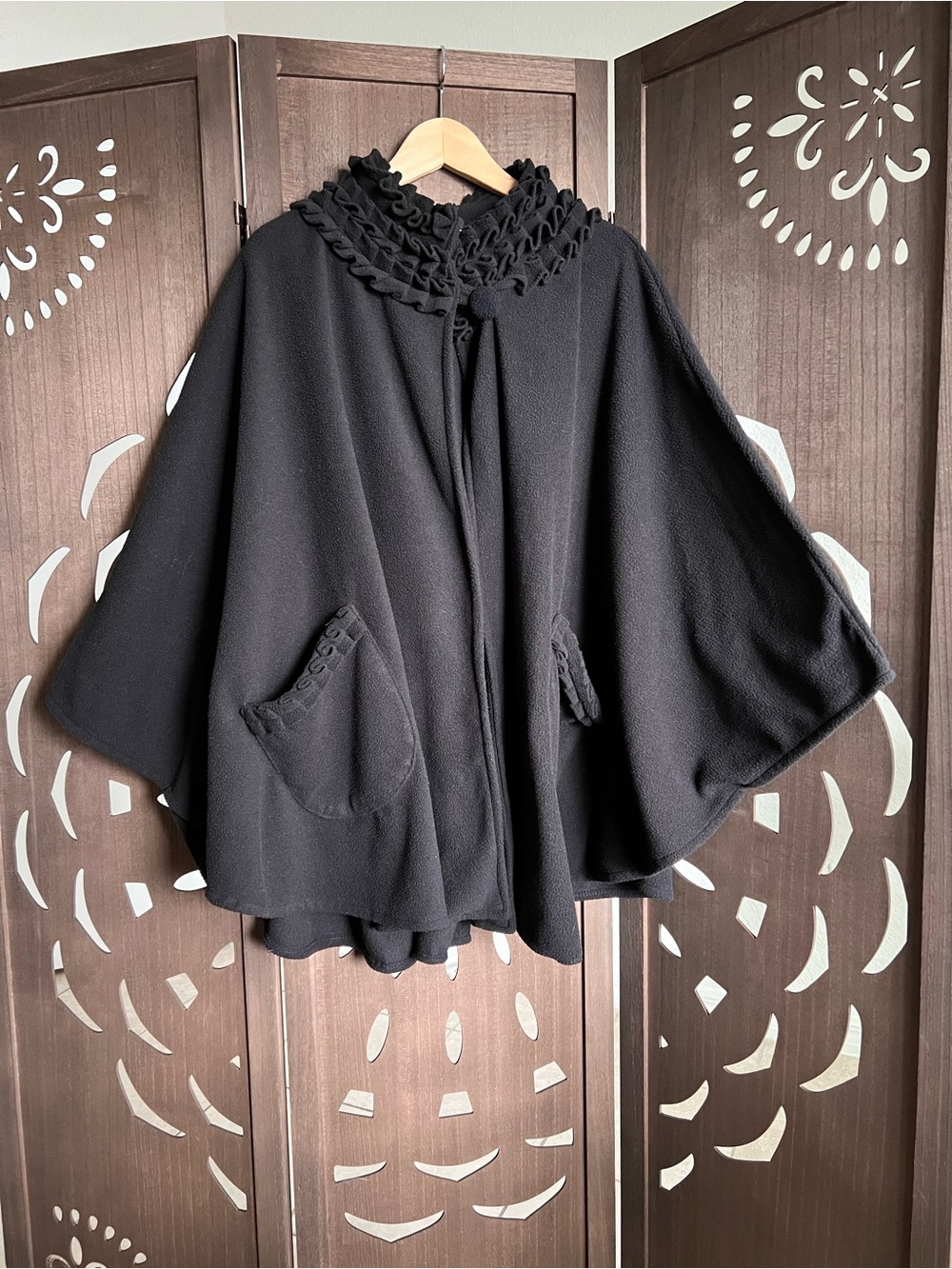 Black ruffled Knit Poncho with Braided Trim